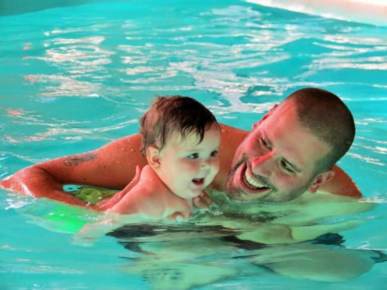 Baby Swimming in Pool